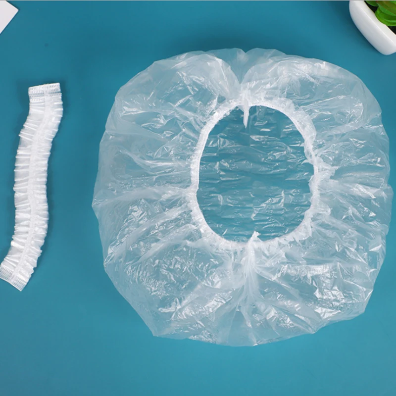 

100pcs Disposable Hair Hats Shower Caps Hat Bathing Caps Hotel One-Off Elastic Shower Cap Clear Hair Salon Bathroom Bath Caps