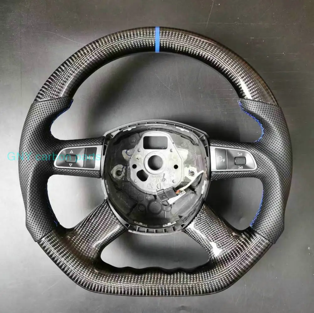 Фото 4-спицевый руль из карбона для Audi A3, A4, A4L, A5, A6L, A7, Q5, Q7 2004-2011 гг. №1
