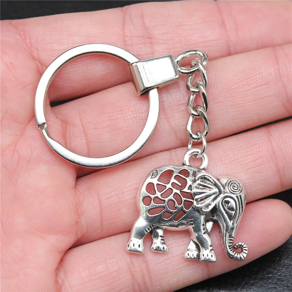 

Souvenirs Gift Men Keychain 2 Colors 27x29mm Hollow Elephant Pendant Keyring Dropshipping