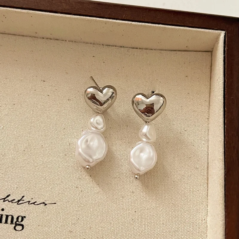 Женские серьги-подвески с жемчугом