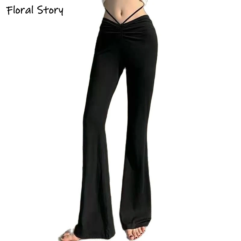 Женские расклешенные брюки с V-образным вырезом однотонные черные длинные в