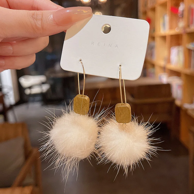 

Women's earrings autumn and winter new hairball versatile super fairy temperament geometric furry earrings