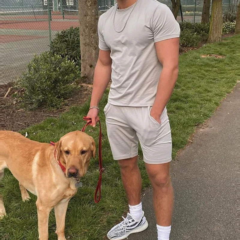 

Men Suit Summer Leisure Sports Fitness Solid Color Round Neck Short-sleeved Pullover Top Mid-waist Lace-up Shorts Two-piece Set