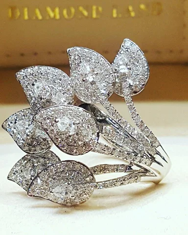 Кольца NovoPublic серебряные с цирконами  для женщин