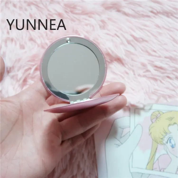 Цветное складное зеркало с сапфировым розовым кристаллом легко носить собой