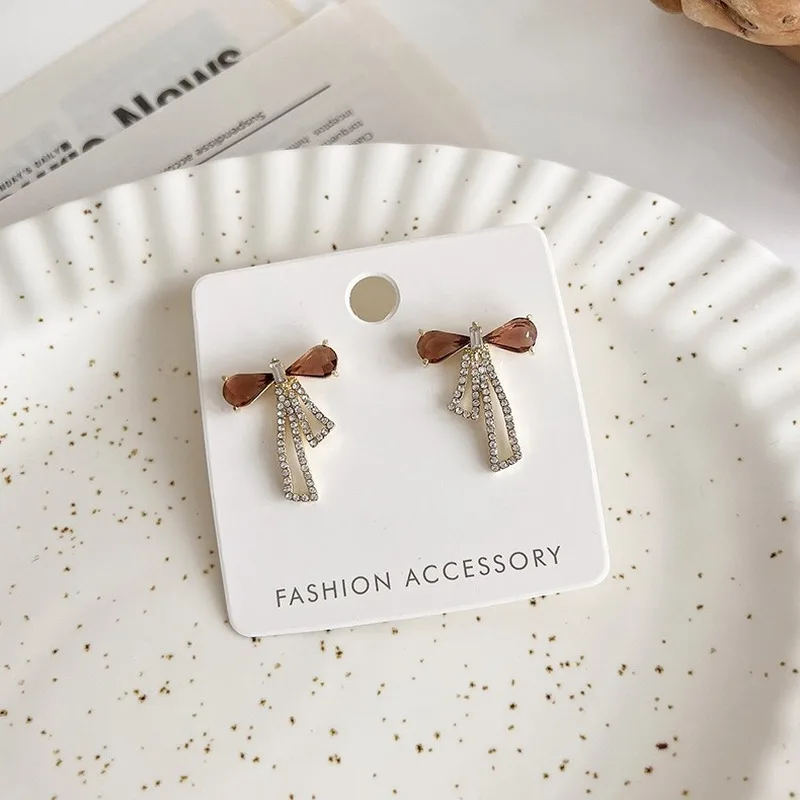

Origin Summer Bling Bling Cubic Zircon Bowknot Dangle Earring for Women Exquisite Long Tassel Hollow Out Earring Jewellery