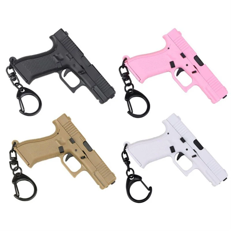 

1Pc Toy Keychain Mini Pistol Shape Tactical Keychain Glock 45 Model Plastic Key Ring Counter Strike Guns Bullet Revolver Keyring