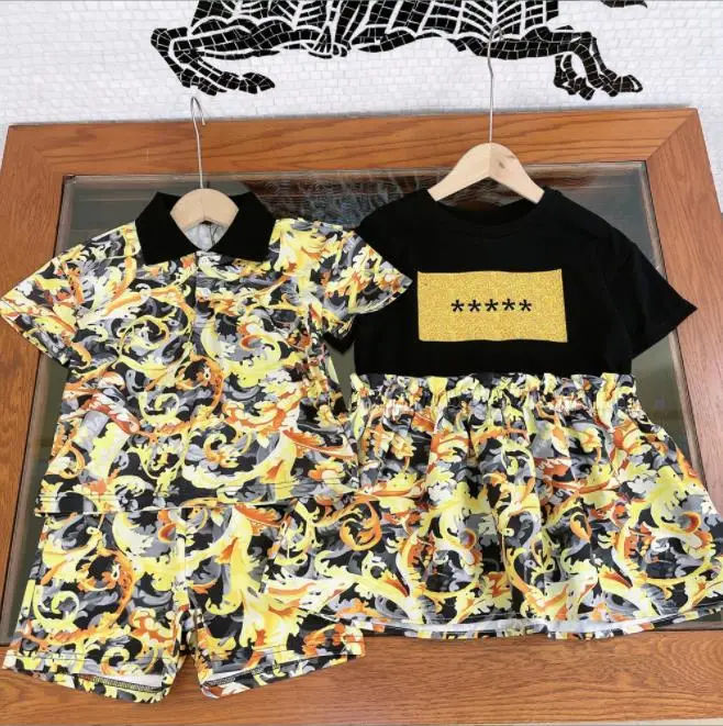 

Комплект из двух предметов: рубашка-поло и платье для мальчиков и девочек