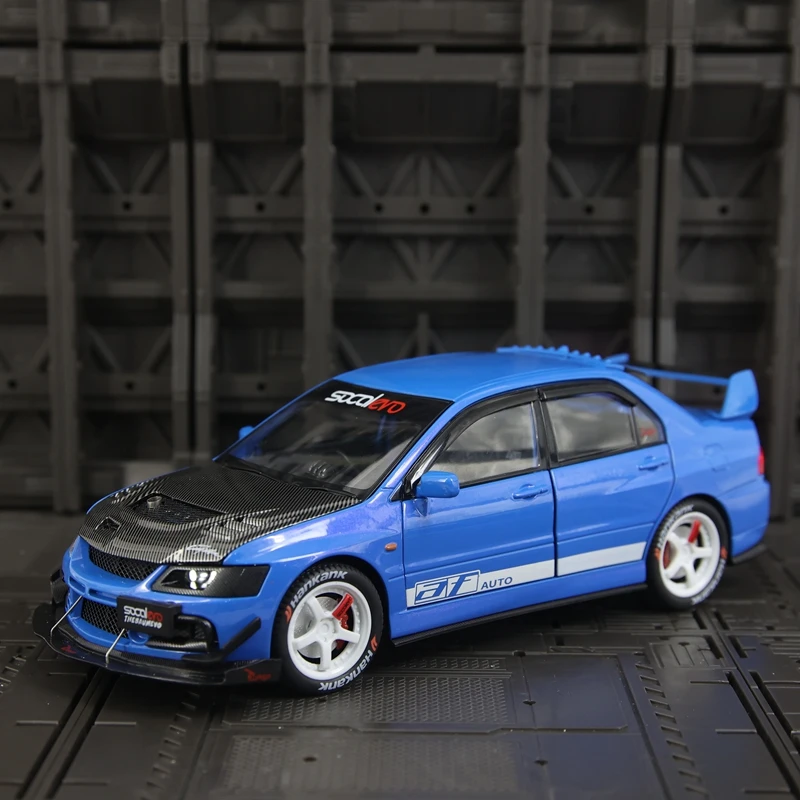 Фото Модель автомобиля Mitsubishi EVO 9 в масштабе 1:24, из сплава, с открывающимися дверями, капотом и багажником, богато детализированная, тонкая работа. №4
