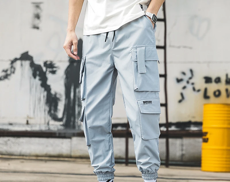 

New in Mens Hip Hop Jogging Pants Casual Men Trousers Loose Sweatpants Male 2022 New Multi Pocket Harem Pants 5XL trapstar y2k h