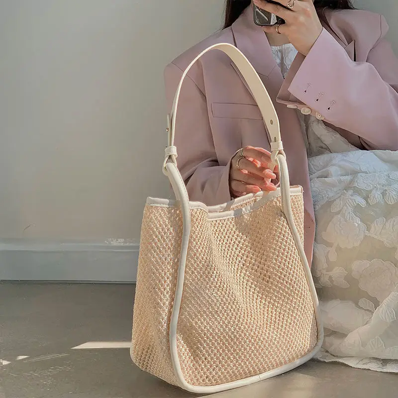

2022 Fashion Hand-held Straw Woven Bag Luxury Designer Handbag Women Tote Bag Large-capacity Shoulder Bags Lady Hollow Beach Bag