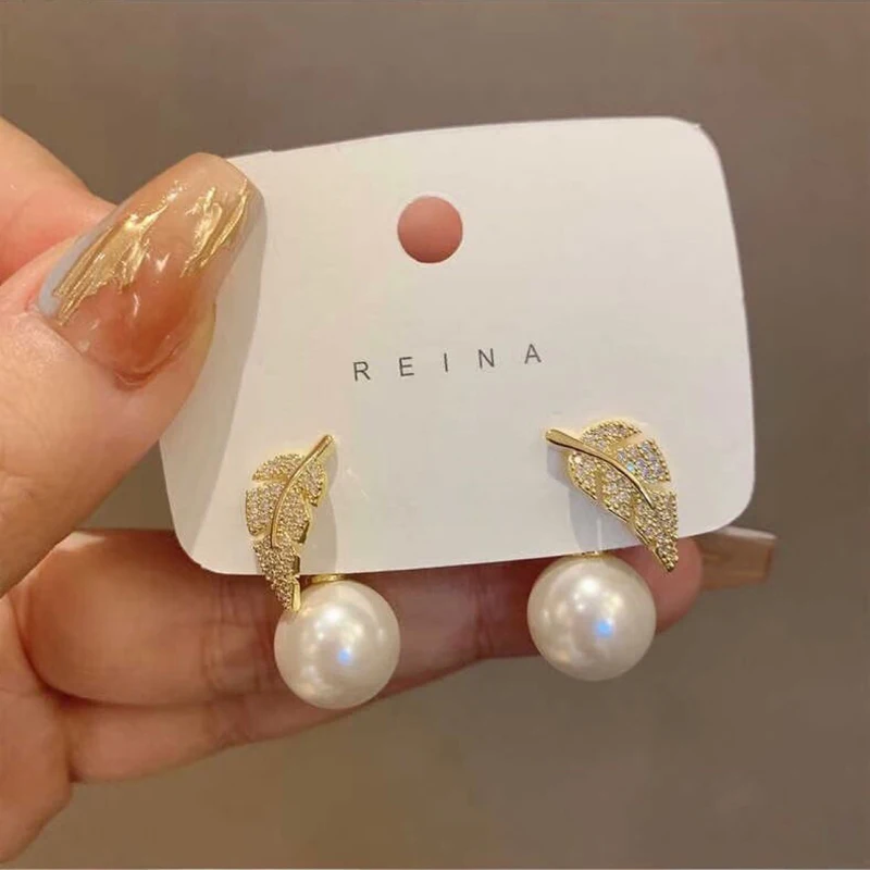 

Korean New Exquisite Leaves Pearl Stud Earrings For Women Contracted Crystal Zircon Bowknot Heart Earring Girl Party Jewelry