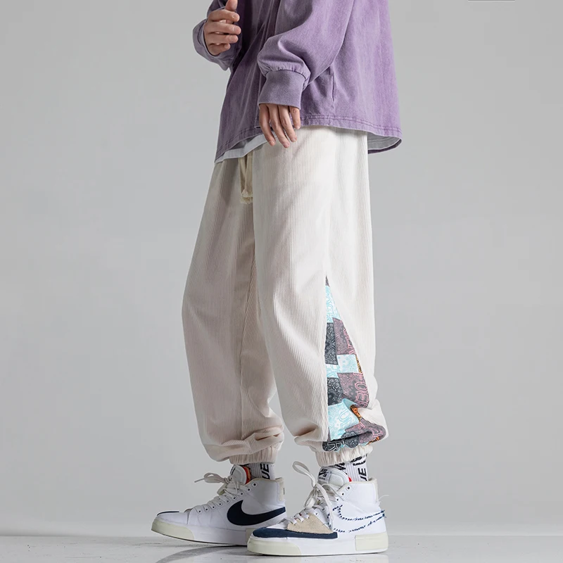 

Streetwear harem men pants 2023 spring new casual jogging pants men patchwork fashion joggers men