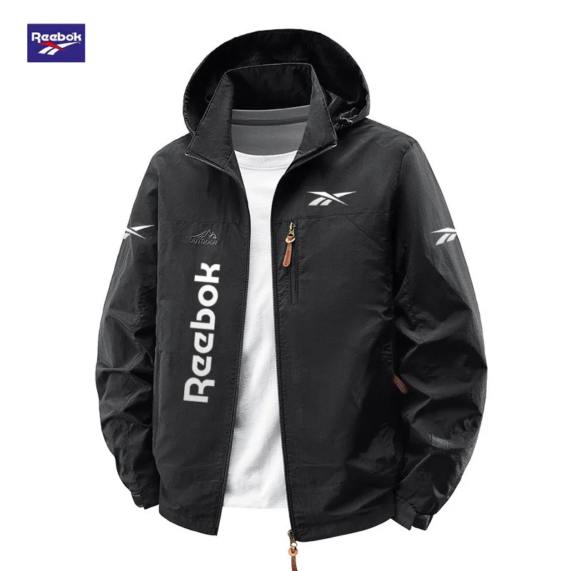 Фото Мужская всепогодная куртка Reebok для весны и осени со съемным капюшоном, подходит для походов, альпинизма и других активностей на открытом воздухе. №1