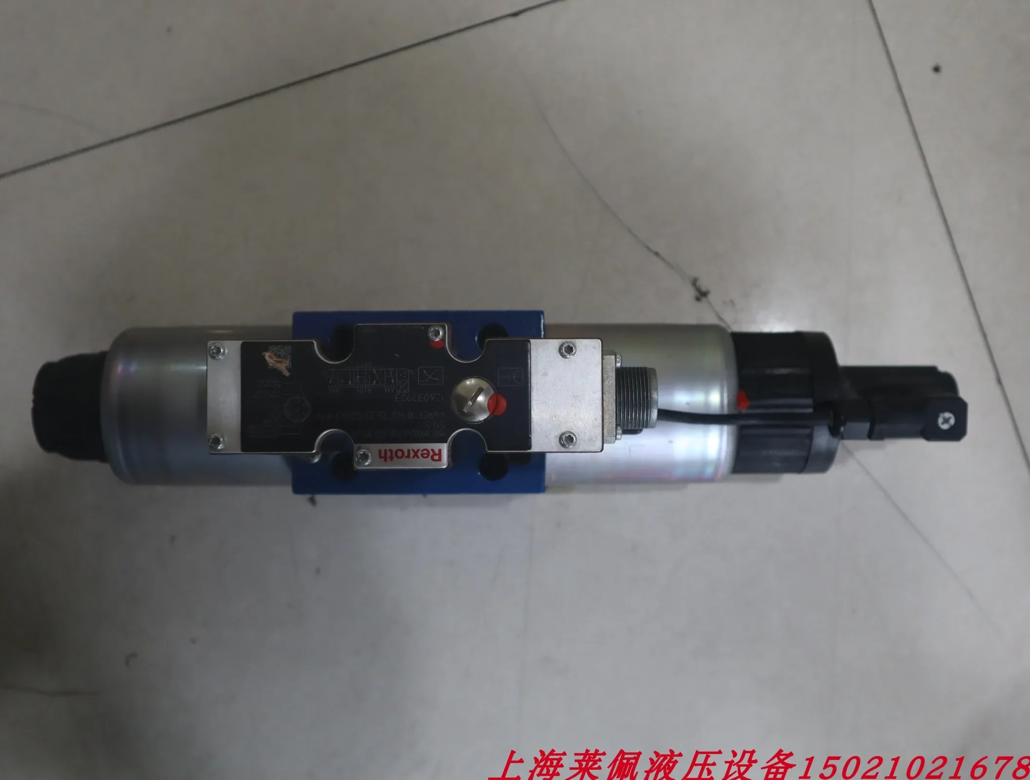 Фото R900244748 4WREE10W3-75-23/G24K31/F1V Немецкий Rexroth REXROTH №1