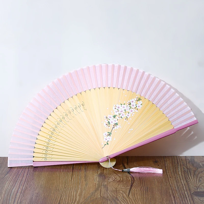 

Chinese style folding hand fanCotton and linen dance fanIt is convenient and practical to carry aroundCollection, gifts, crafts