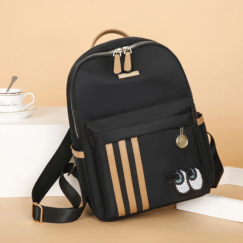 

Женский рюкзак из ткани Оксфорд, модный школьный ранец с мультипликационным контрастным рисунком, удобная Легкая дорожная сумка большой вм...