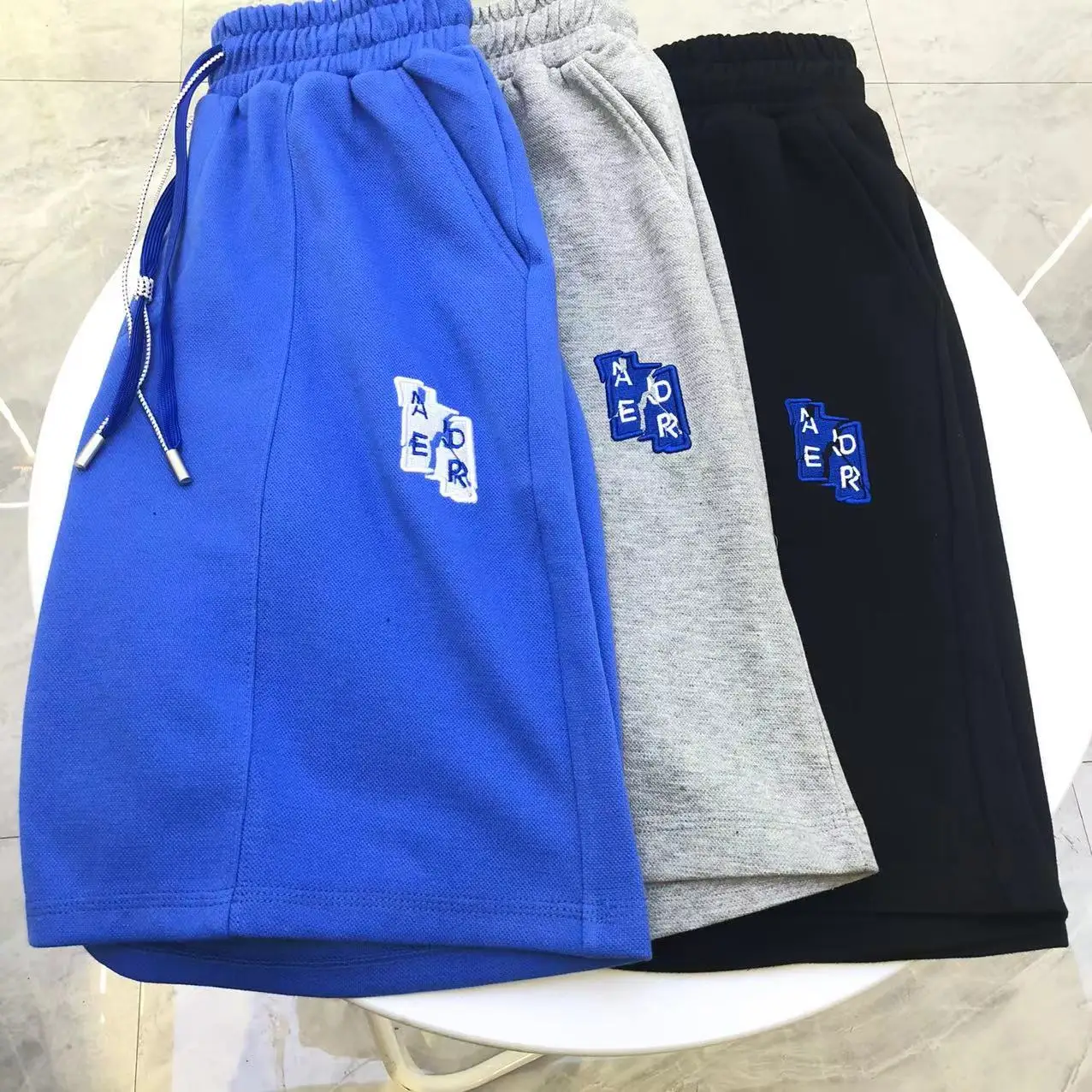 

ADER ERROR Embroidered sweater shorts