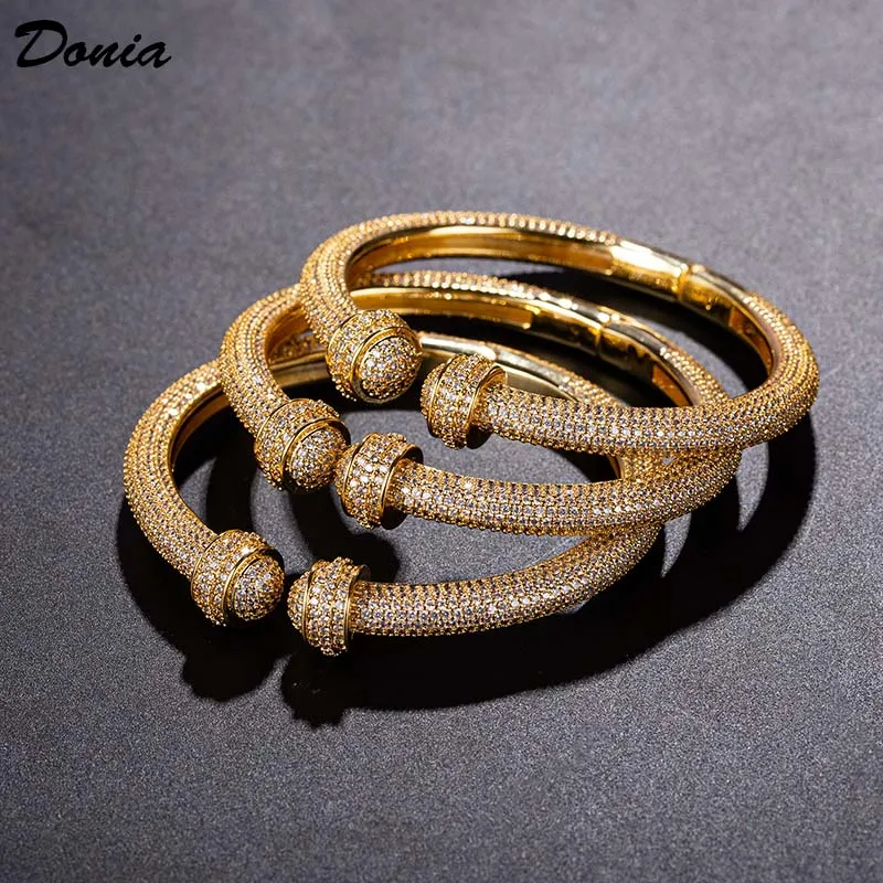 

Donia Jewelry European and American Fashion Bud-Shaped Titanium Steel Micro-Inlaid AAA Zircon Luxury Retro Open Bracelet.