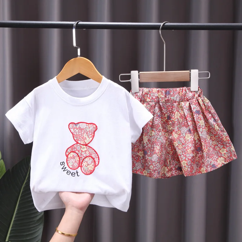 

Летняя футболка для девочек, новинка, детская юбка с цветочным принтом, Повседневная футболка из двух предметов с короткими рукавами и мультипликационным принтом в иностранном стиле