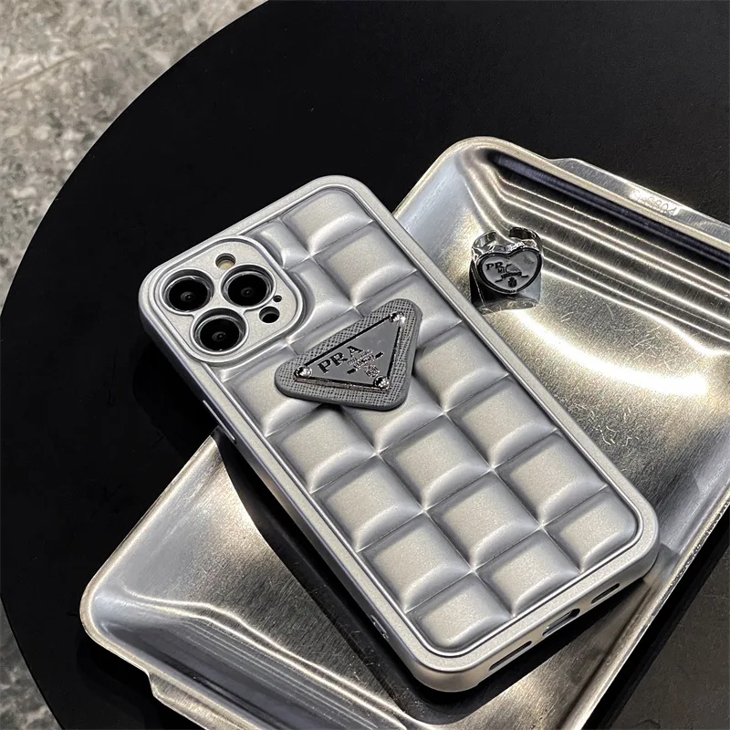 

The new tide brand three-dimensional lattice triangle logo for iPhone14promax phone case Apple 11 anti drop 14 silicone 13 phone