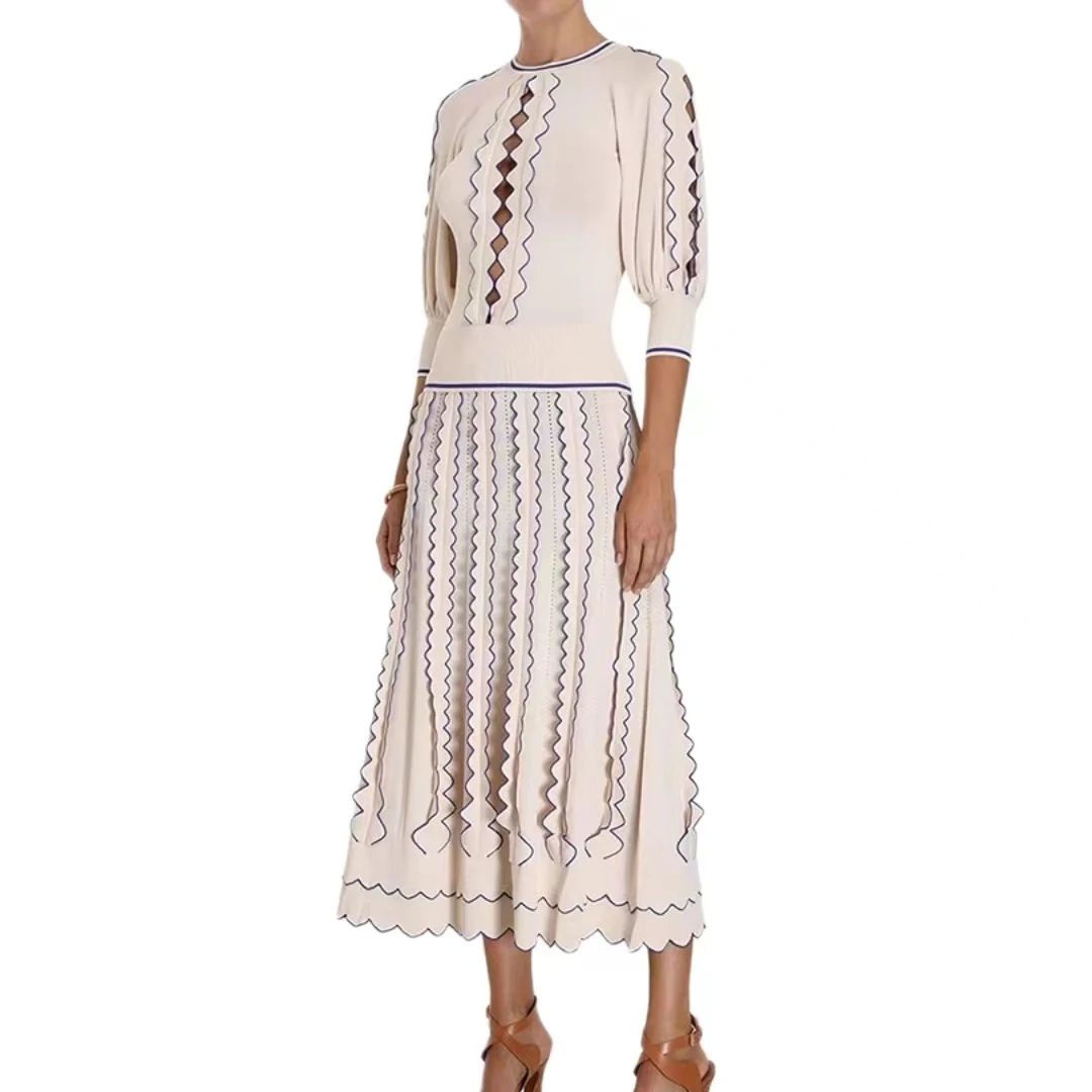 

2023 Autumn /Winter New Women's Long Sleeve Knitted Hollow Top Wave Design Half Skirt Two Piece Light Luxury Style Set