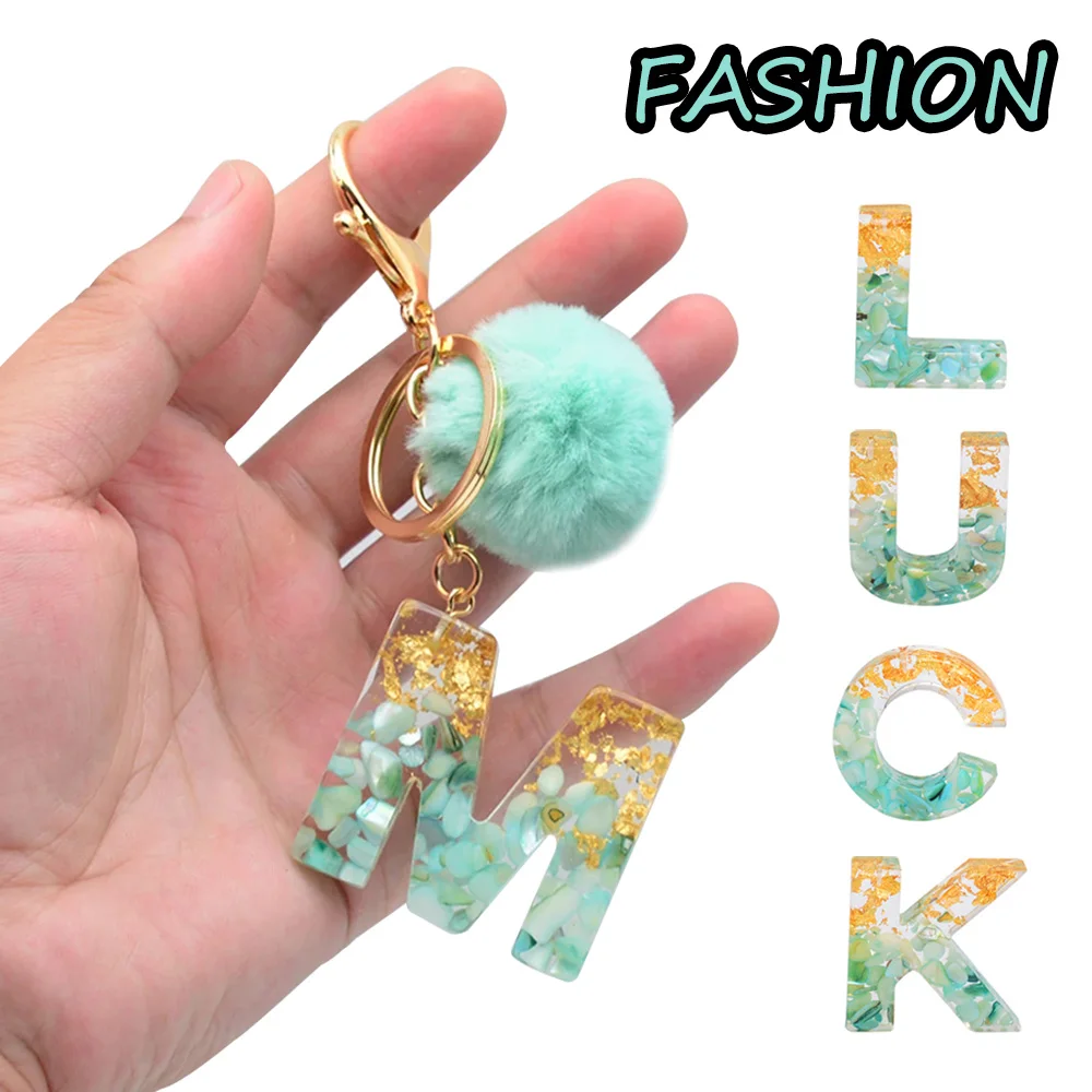 

Fashion Gold Foil Filled 26 Initials Letter Keychain With Green Fluffy Pompom Women Glitter Gradient Acrylic Alphabet Keyring