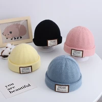 baby knitted hat autumn and winter new korean childrens wool hat cloth label candy color concave shape melon leather hat 2021