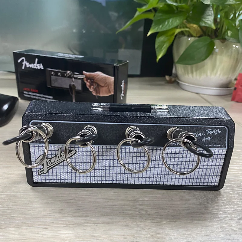 1 набор держатель для ключей с музыкальным логотипом 4 брелоками |