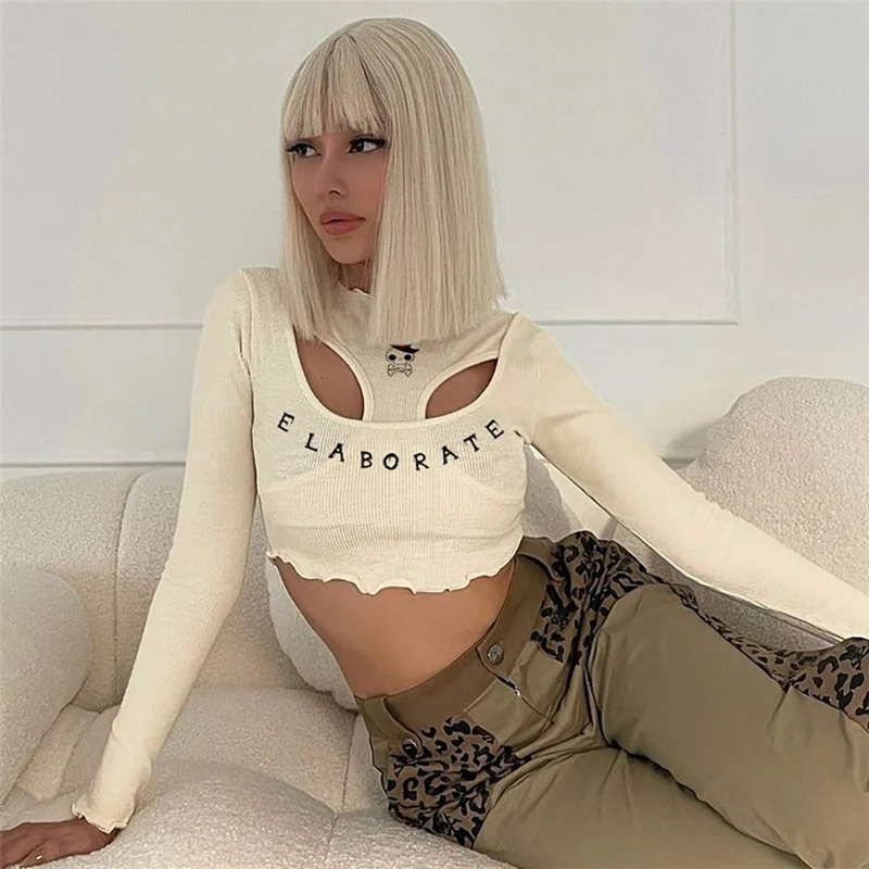 

Женский ТРИКОТАЖНЫЙ УКОРОЧЕННЫЙ ТОП с вырезами, длинным рукавом и открытой спиной