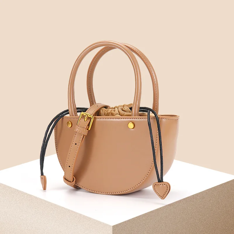 

Leather saddle small bag women's 2022 new fashion French minority design high sense popular Messenger, versatile in summer