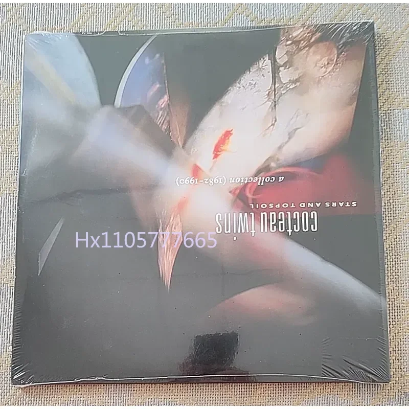 Фото 4AD Cocteau Twins Stars And Topsoil White Glue Виниловая пластинка 2LP для Color Glue №1