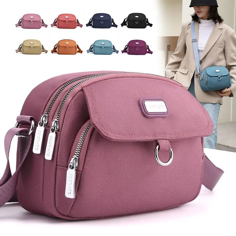 

2023 Summer New Fashion Casual Multi Layered Oxford Fabric Mobile Bag Single Shoulder Oblique Straddle Small Backpack