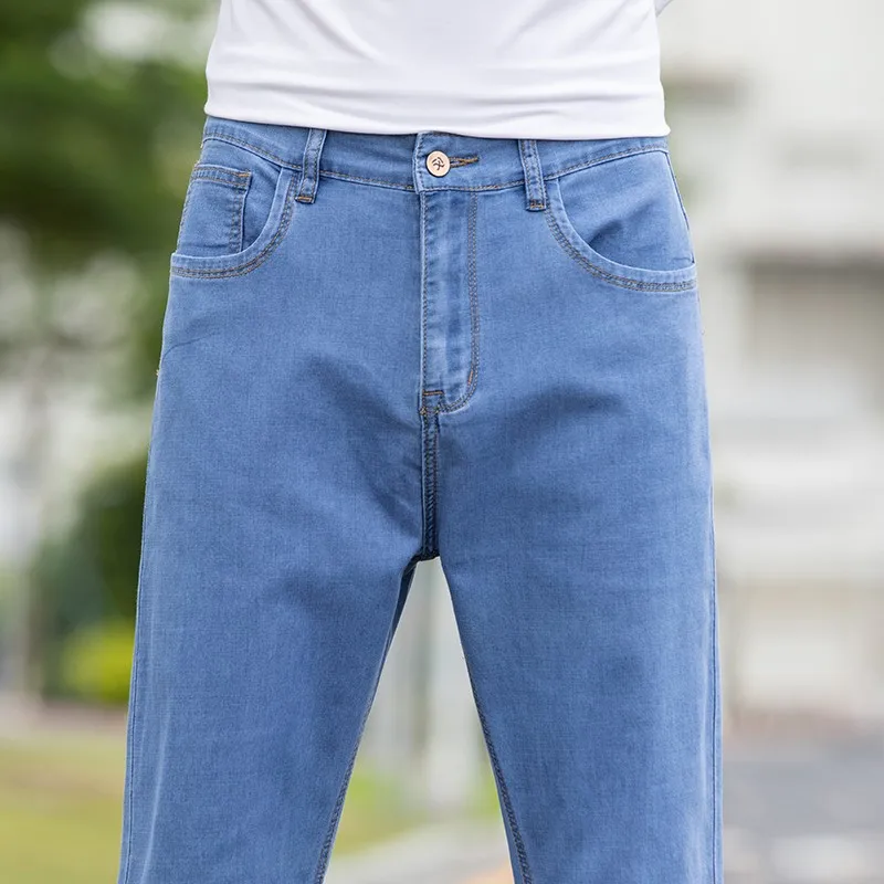 

2022 New Men's Light Blue Men's Classic Black Jeans Elastic Loose Fit Denim Jean Trousers Maleplus Size 40 42 44