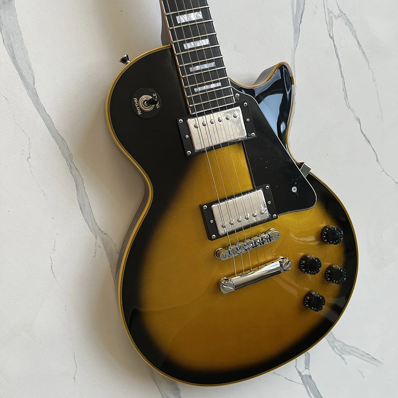 

Classic LP electric guitar, gold powder bright paint, mahogany solid wood, quality accessories, free delivery to home.