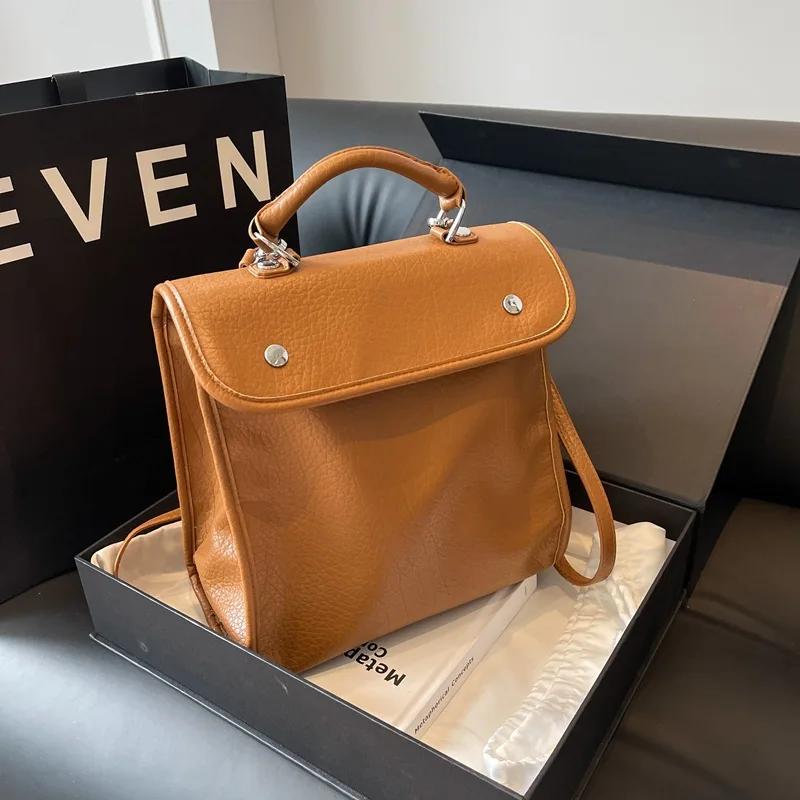 

Fashionable and trendy women's solid color British style backpack 2023 niche temperament Korean version girl trend luxury bags