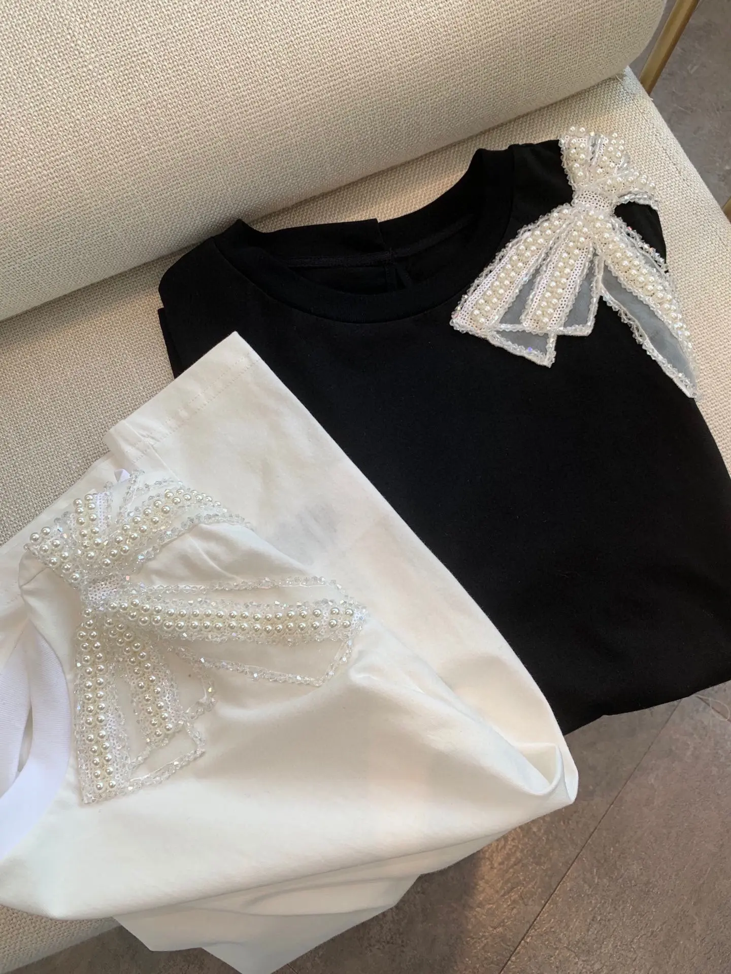 

Top Female Clothing Women T-shirt One Piece Woman Clothes Fashion Woman Blouses 2022 Pearl Bowtie Tassel Top