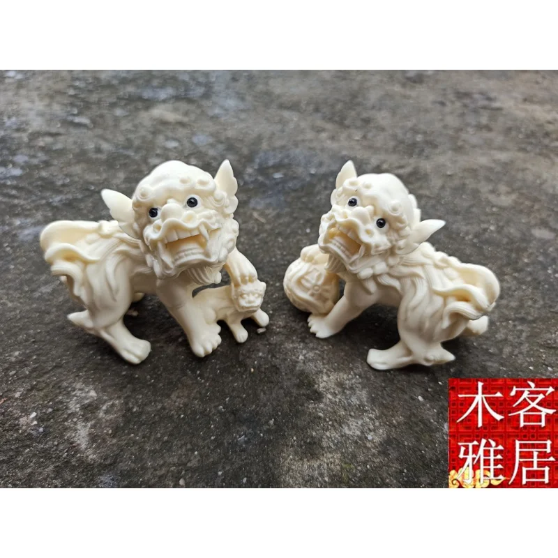

Ivory Nut Hand Pieces Crafts Auspicious Lion God Beast Animal Gatekeeper Lion Home Fortune Feng Shui Crafts Car Decorations