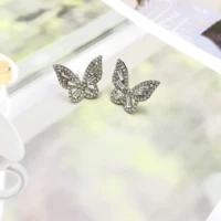 gold and silver butterfly earrings go with everything earrings in the shape of animals