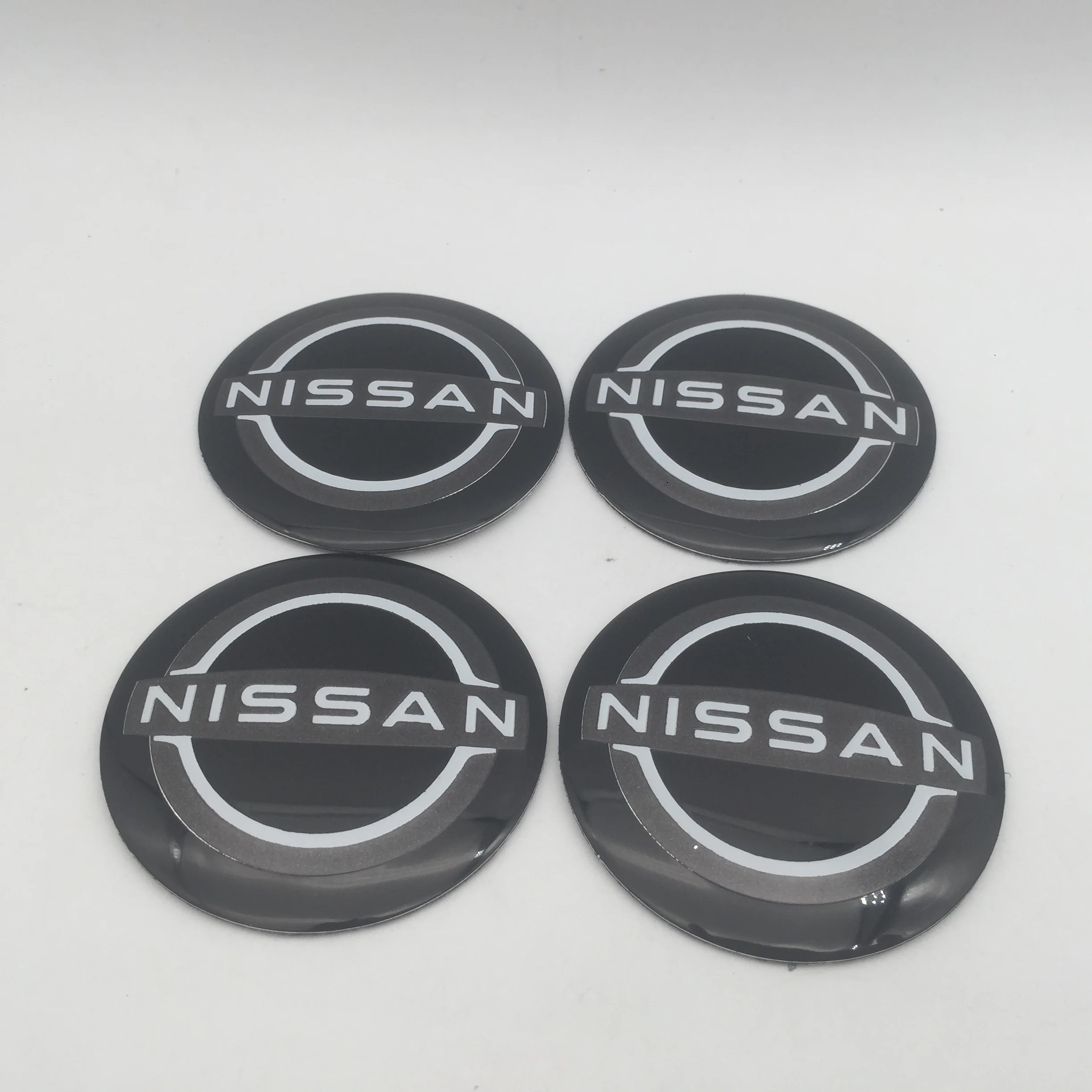 

4 шт. 3D 56 мм 60 мм 65 мм для автомобиля Nissan, эмблема ступицы колеса, центральная крышка, крышки значка, наклейки, наклейки, аксессуары для стайлинга