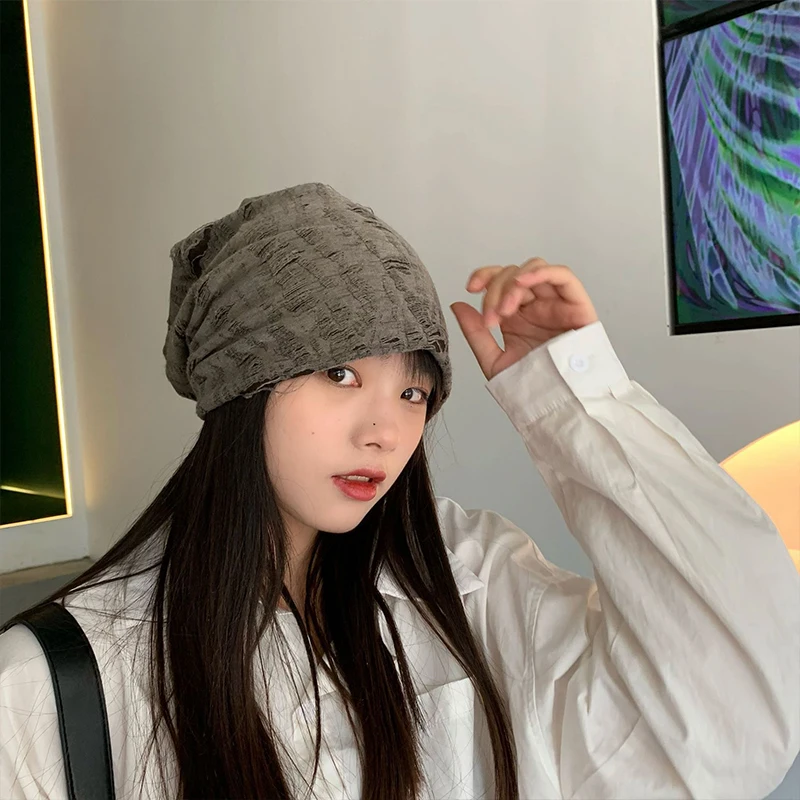 

New Personality Women's Korean Street Trend Ripped Knitted Hats Autumn and Winter All-match Pile of Turban Hats for Men