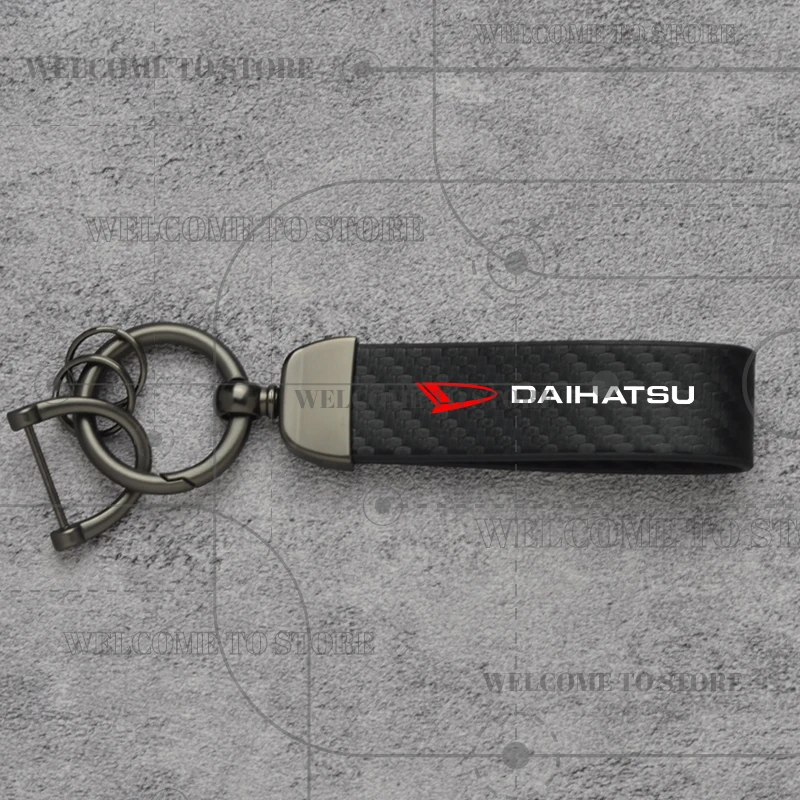 

Углеродное волокно для Daihatsu Sirion Feroza Terios Storia Rocky Sigra Mira, эмблема, модный кожаный брелок для мужчин и женщин, автомобильный брелок для ключей