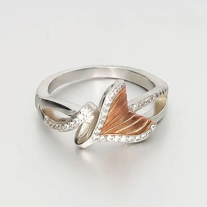 

HESHI Brass Material Platinum Plated and Rose Gold Plated Romantic Tail Fin Wave Shaped Rings with for Women