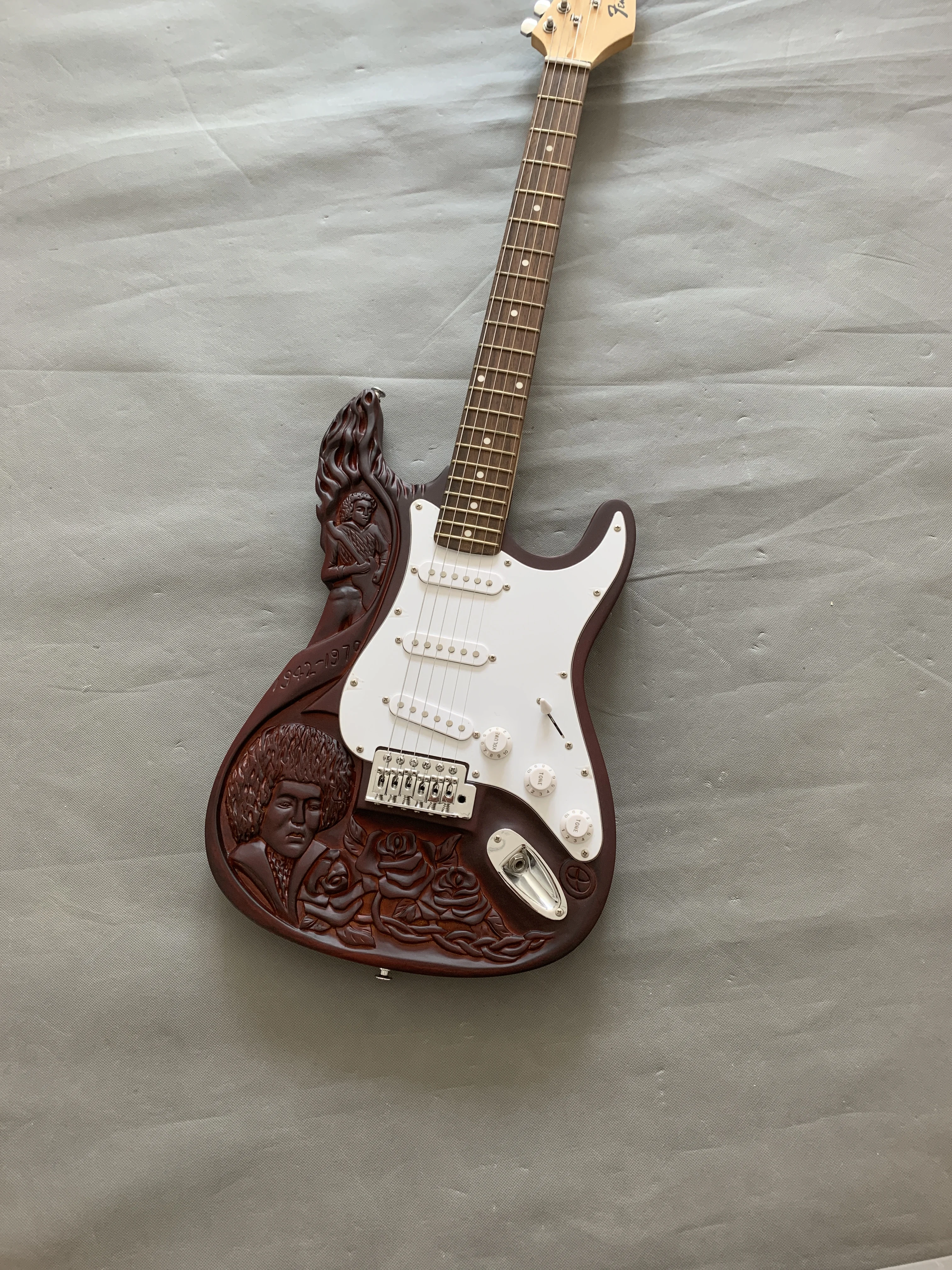 

Made in China, custom carved Jimmy 6 string electric guitar, CNC Seiko carving, three single pickup, free shipping