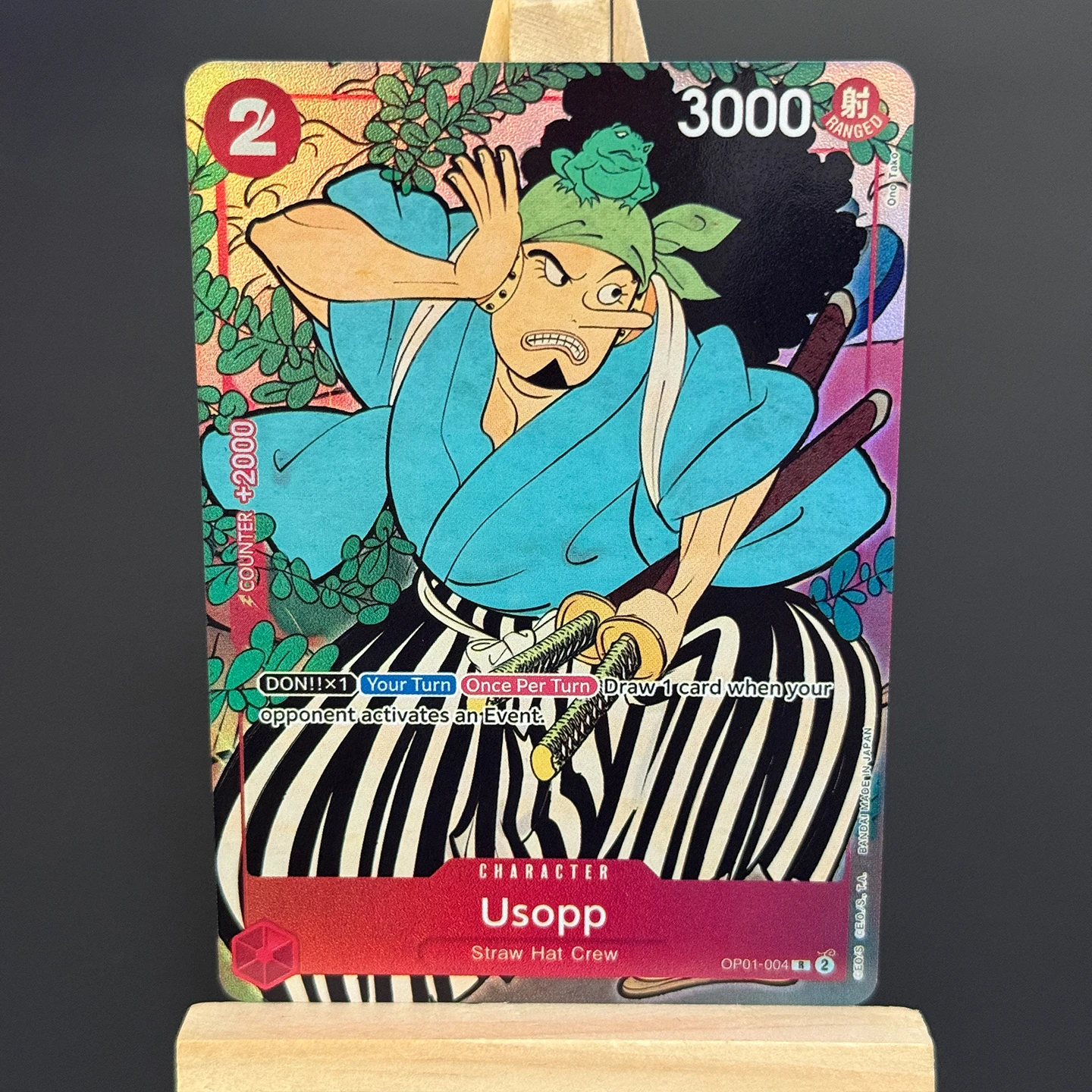 Фото Коллекционная карта One Piece TCG OPCG на английском языке: Нами R OP01-016, набор к 1-му юбилею, фольгированная карта (прокси) №3