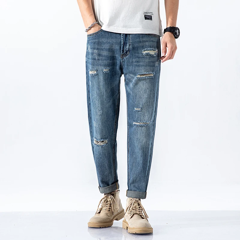

Spring and Autumn Light Color Hole Casual Trend Jeans