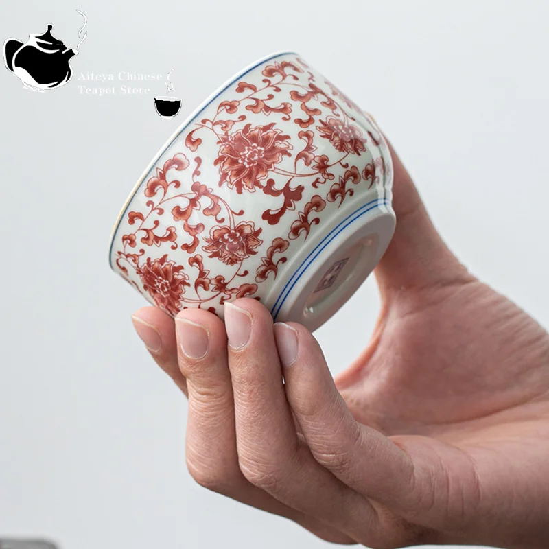 

Blue and white underglaze red pressure hand cup handmade entangled branches with patterns antique ceramic single cup tea tasting