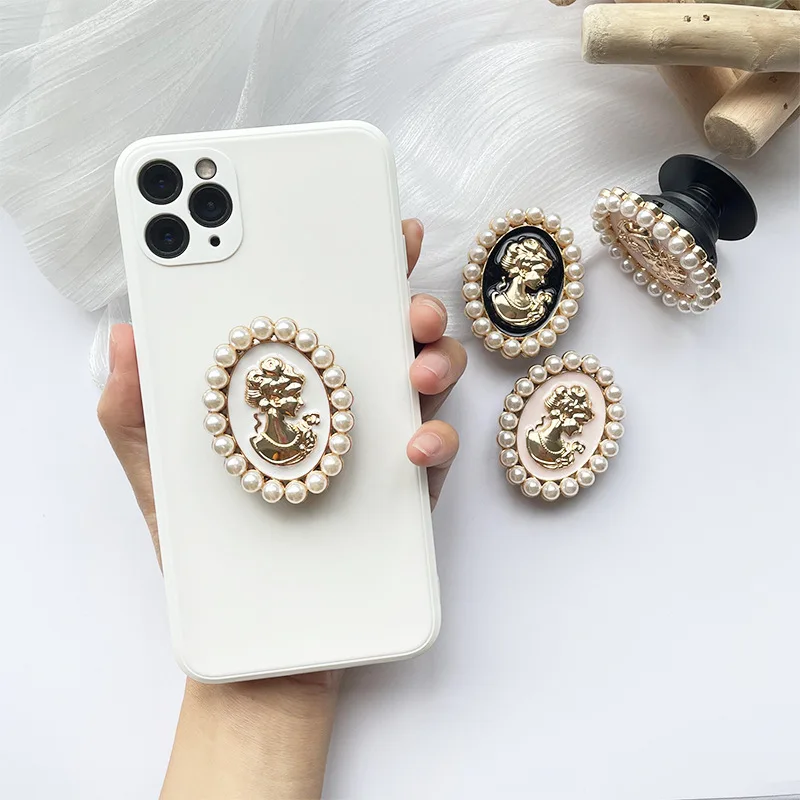 

Electroplating Shiny Cellphone Holder Pearl Folding Lazy Desktop Holder Suitable for IPhone XS Grip Shrink Mobile Phone Holder