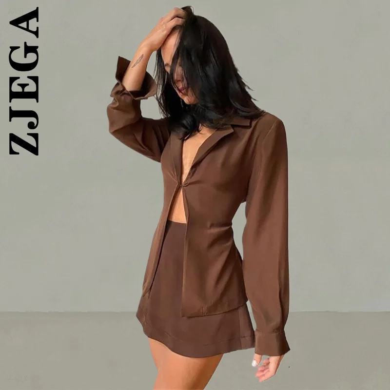 

Новый женский комплект Zjega, коричневый топ с длинным рукавом, юбка с высокой талией и отложным воротником, пуговицы, комплект из двух предмет...