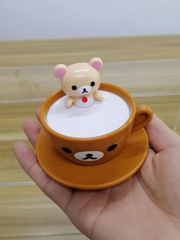 

Mcdonaldss Cute Rilakkumaa Relax Enjoy Milk Bath Bears Coffe Cup with Wheel Spin Cartoon Dolls Children Gifts Table Ornaments